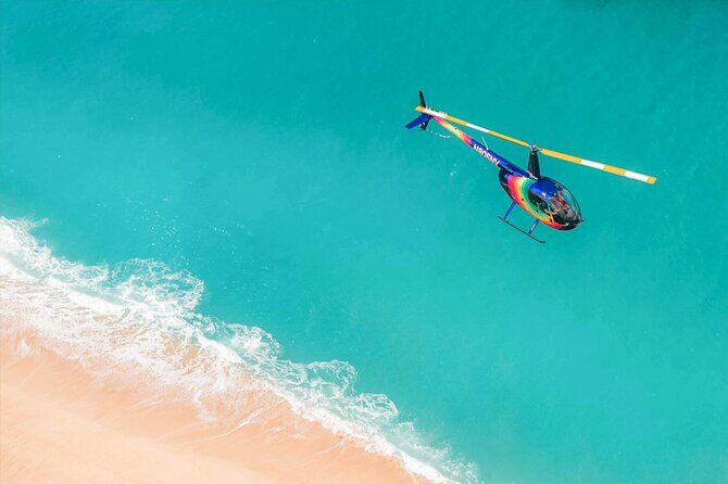 City By The Sea - 20 Min Helicopter Tour - Doors Off or On - Punchbowl Crater and the National Military Cemetery: a quieter aerial moment