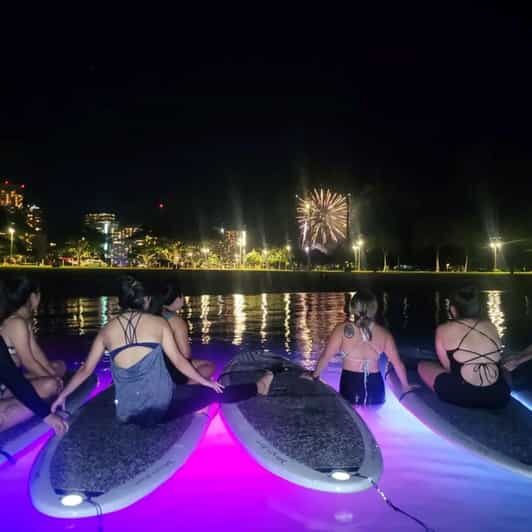 Honolulu: Fireworks Glow and Flow Yoga Class - LED Lights, Color Flow, and the Honolulu Skyline After Dark