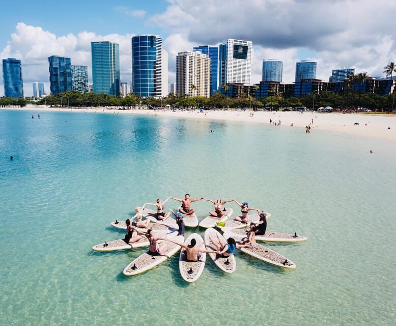 Honolulu: SUP (Standup Paddleboard) Yoga Class - The appeal: balancing yoga and the ocean at Magic Island