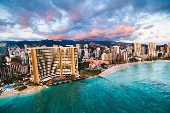 Oahu: 45 Minute Sights Unseen Helicopter Tour - Doors Off or On - Pearl Harbor and the USS Arizona Memorial pass: solemn, not scenic