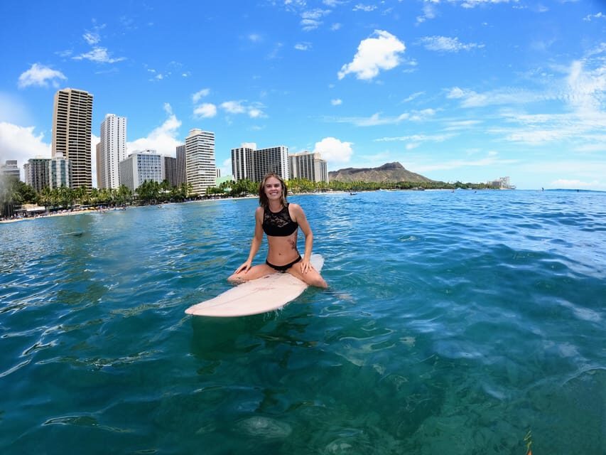 Oahu: Waikiki Beginner Private Surf Lesson- Female Guide - Paddling out together for your first waves