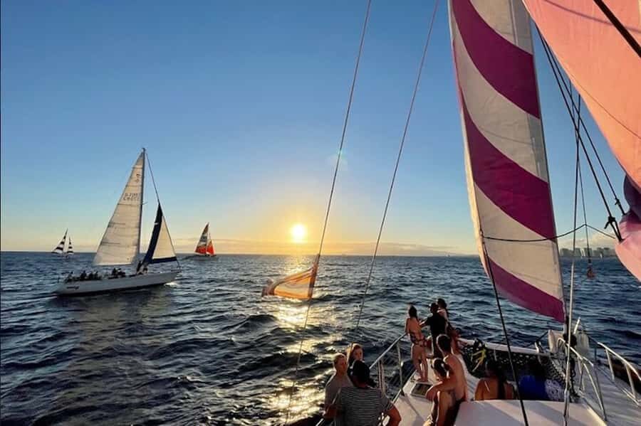 Oahu: Waikiki Sunset Catamaran Sail and Swim - Golden Hour on Oahu: Orange-Sky Colors and Waikiki Light-Up Views