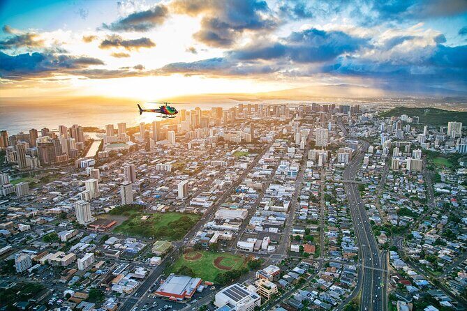 Waikiki Sunset - 50 Min Helicopter Tour - Doors Off or On - Honolulu to Waikiki: reds and oranges over the city